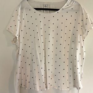 Asymmetric hem polka dot blouse with silky back
